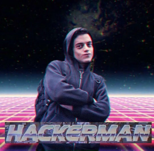 This meme is an image of the character "Hackerman" from the TV show "Hacks" with a serious expression. The text "Hackerman" appears in bold, futuristic font at the top of the image. The overall tone of the image is one of intense, high-tech seriousness, implying that the character is a master hacker.
